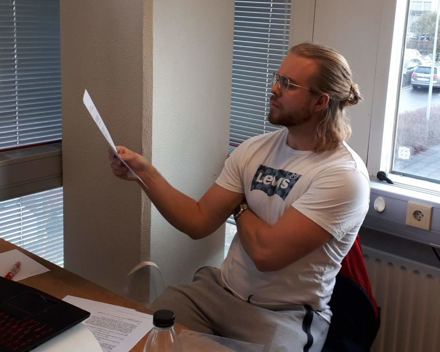 Bergur Snorrason contemplating a piece of paper.